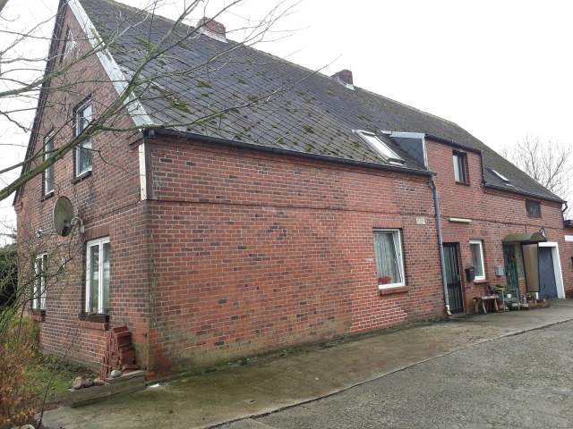 Bild: Haselau - KAPITALANLAGE: Vermietetes 3-Familienhaus mit Garage und Garten